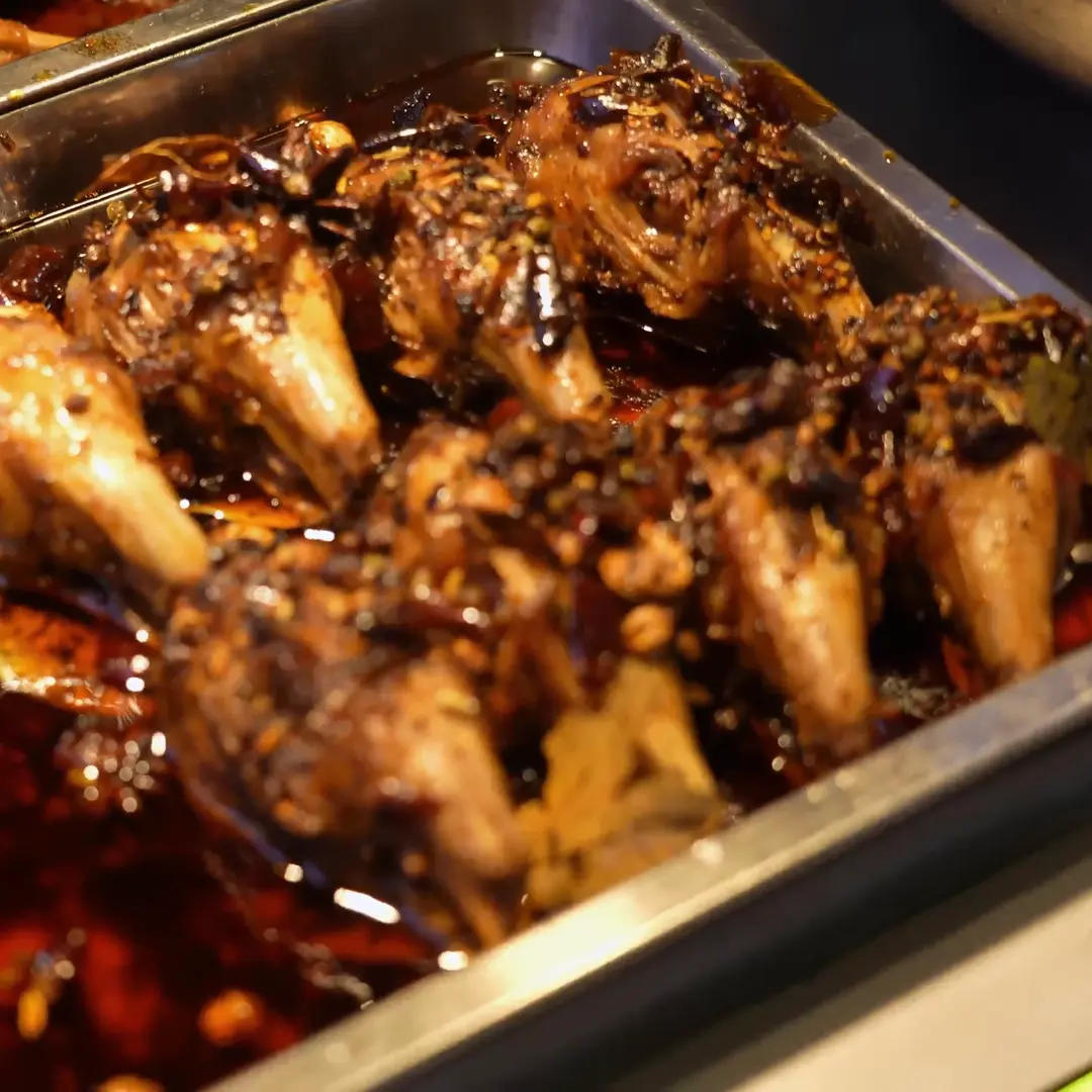 Close-up of oil-braised rabbit heads